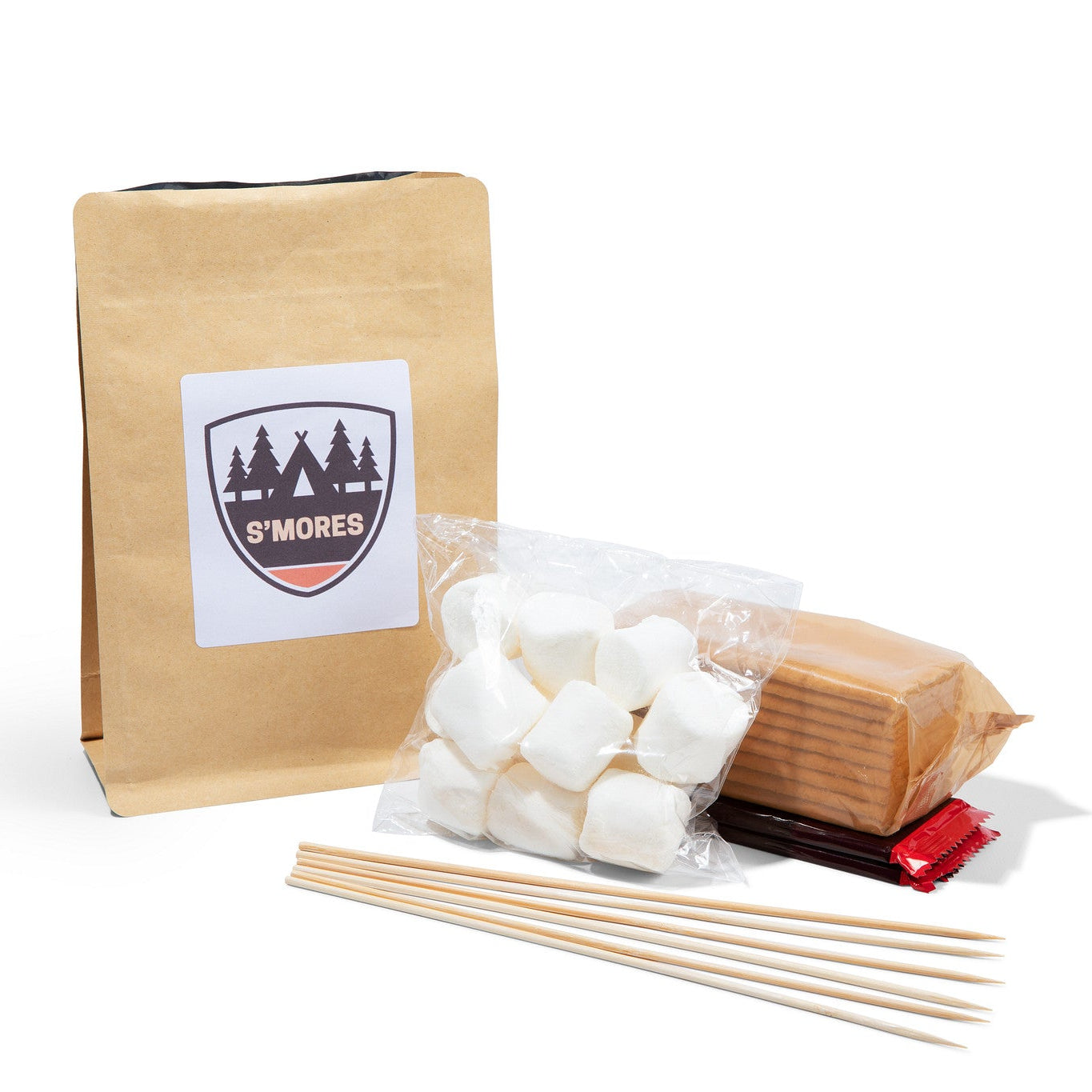 S'mores kit with marshmallows, chocolate bars, and sticks on a white background